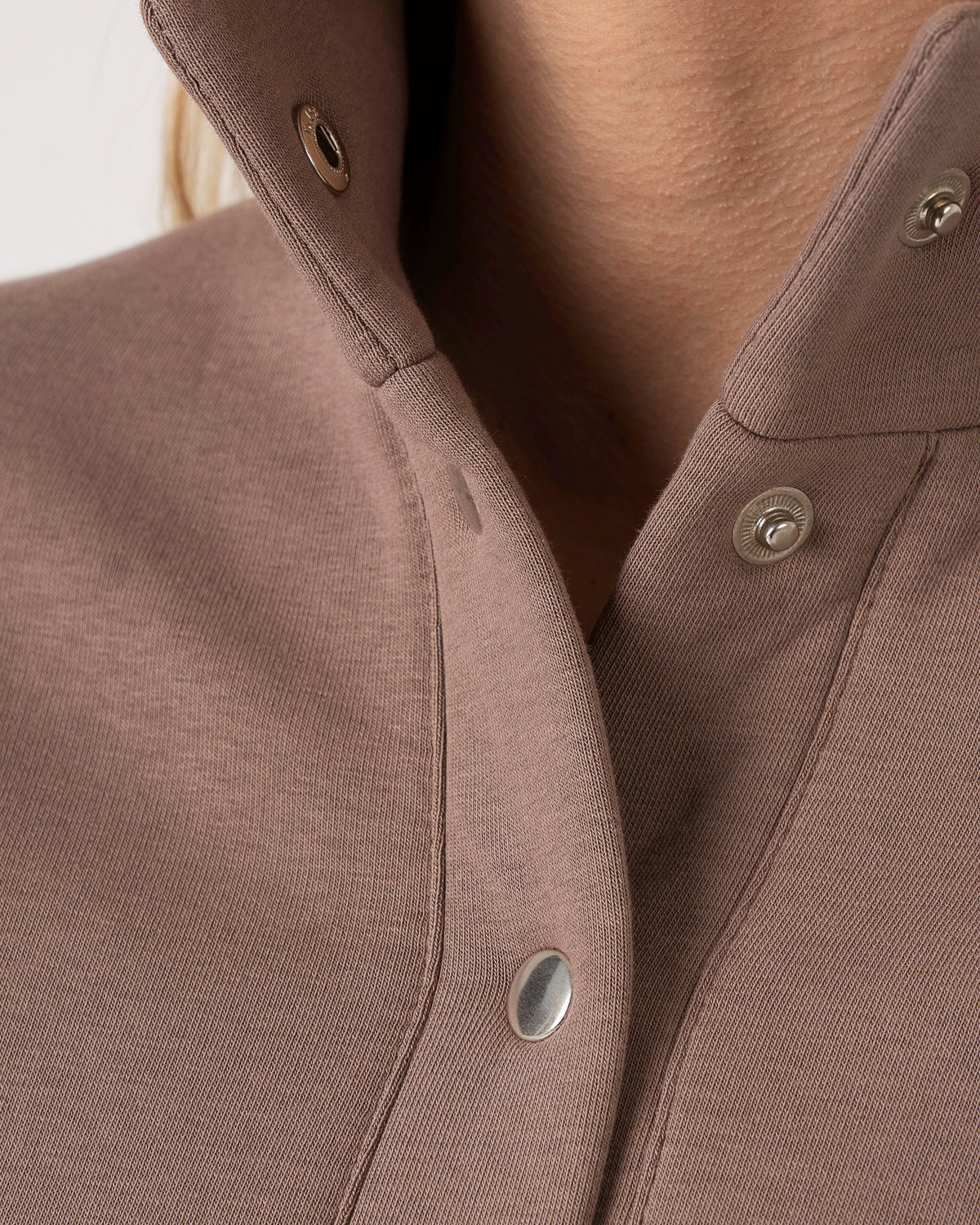 Warm casual set with buttons and straight-leg trousers, in a bleached cocoa shade