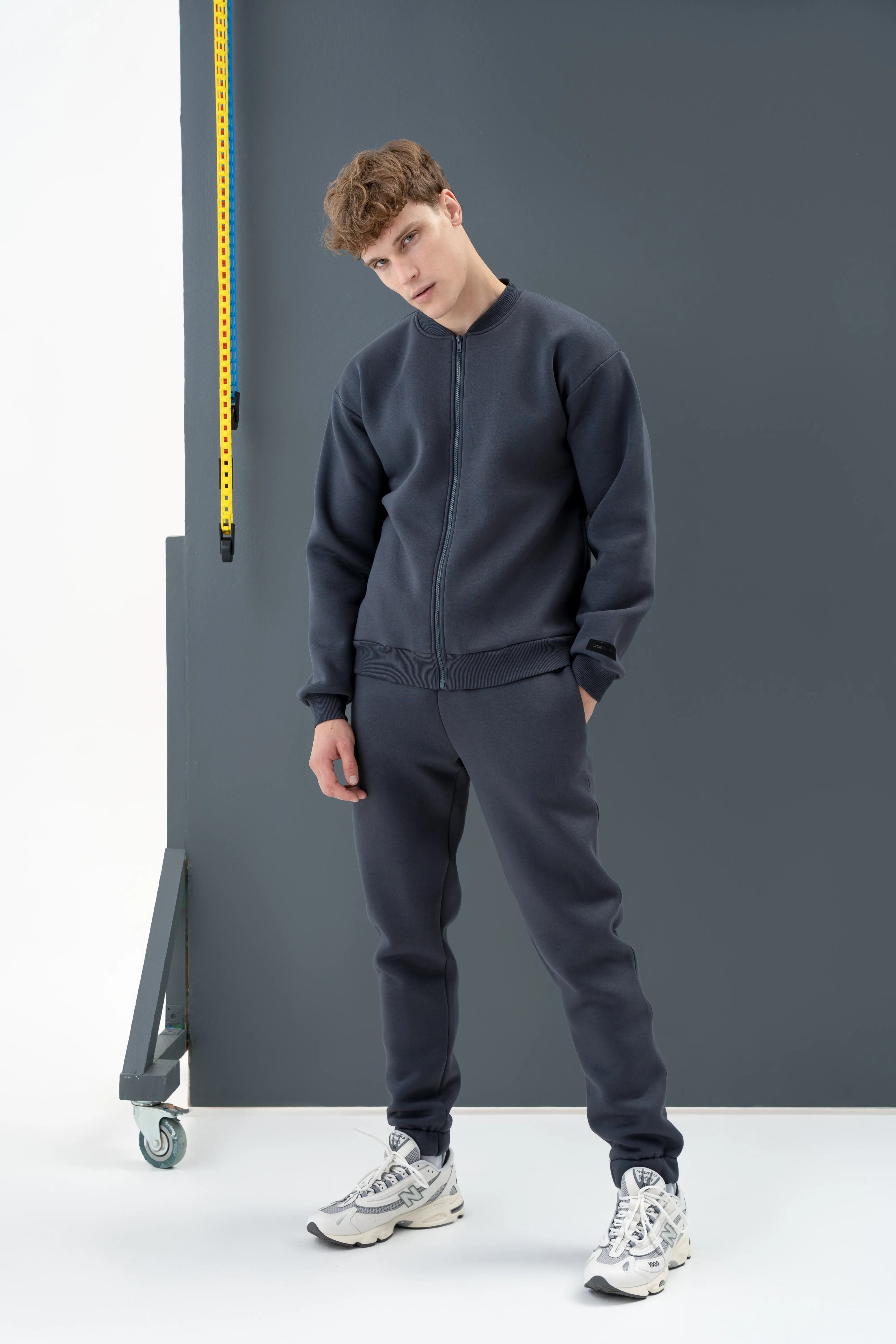 A comfortable graphite-toned men’s tracksuit from cutmyfashion, perfect for travel and active leisure.