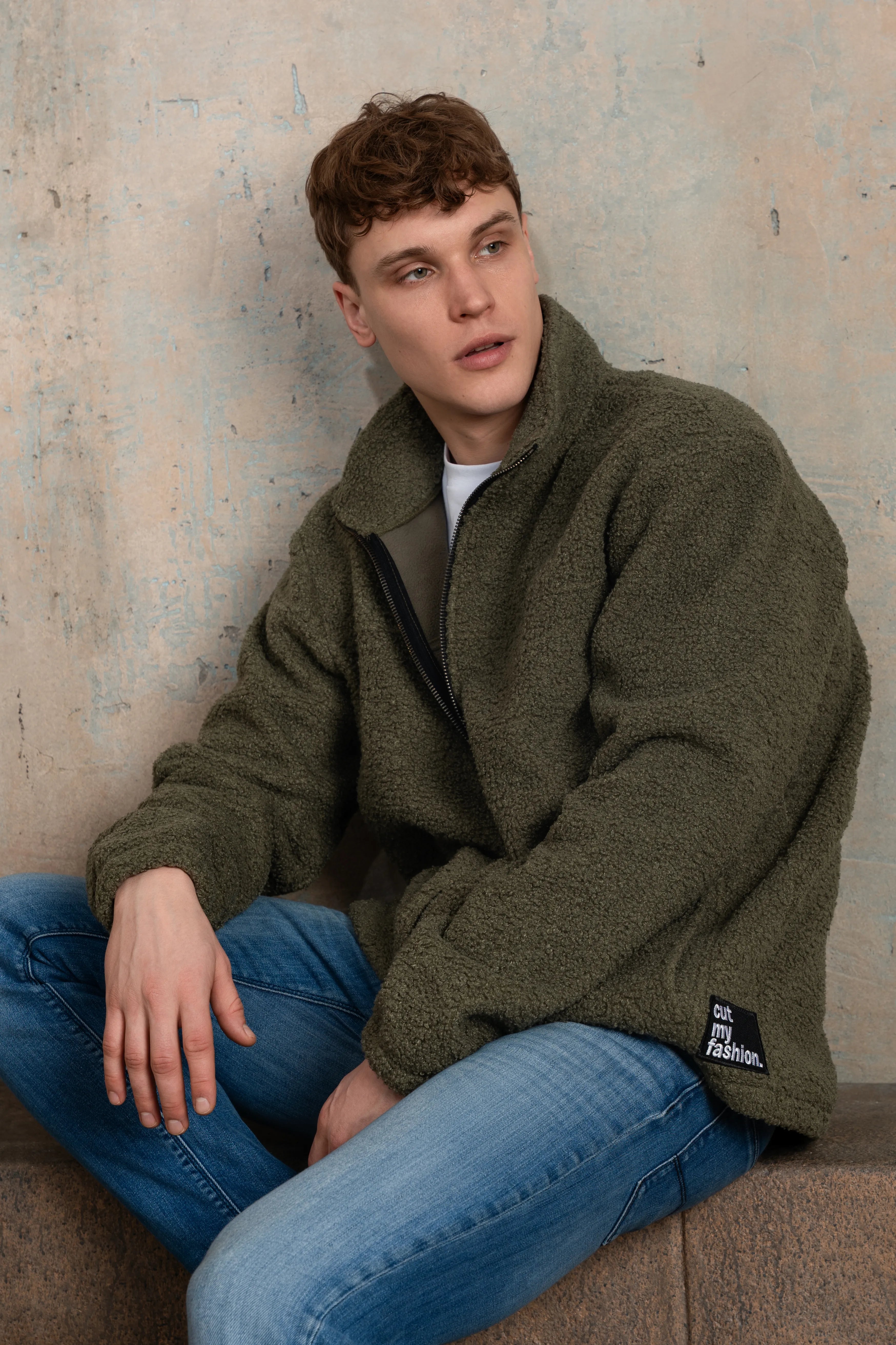 Khaki men's fleece sweatshirt with a full-length zipper and side view