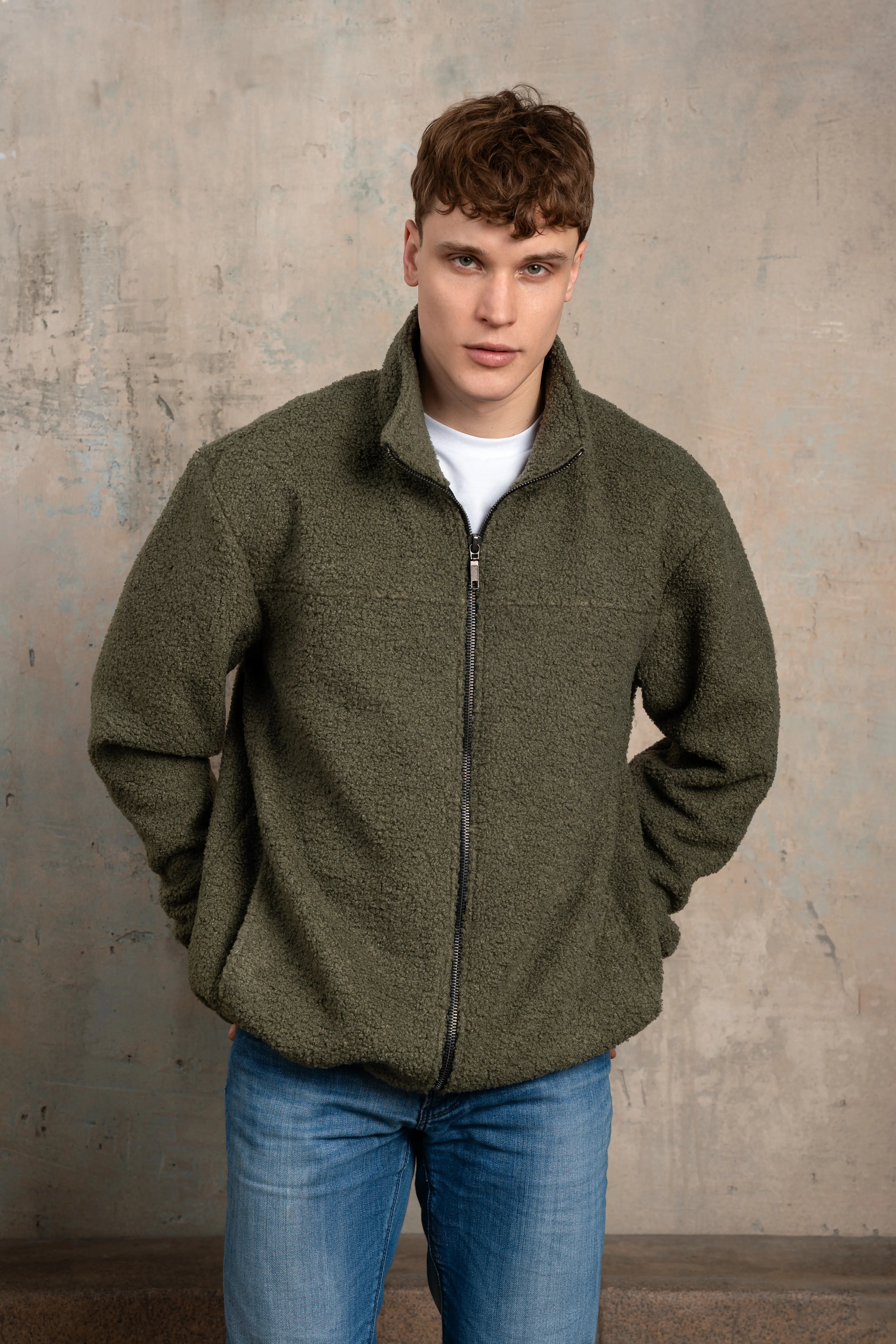 Khaki men's fleece sweatshirt with a full-length metal zipper, stand collar, and long sleeves